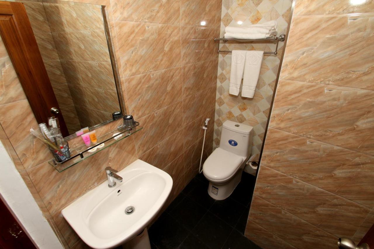 Gemsy Hotel Yangon Zimmer foto